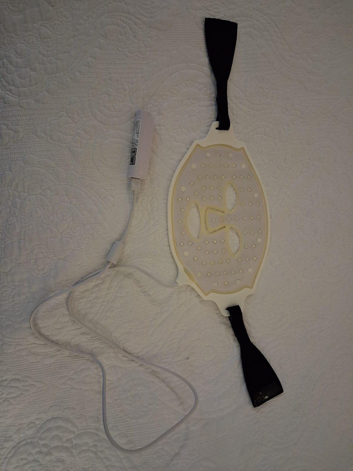 Inside of the flexible IllumiaSkin MK-05 mask showing eye and mouth openings and LED positions